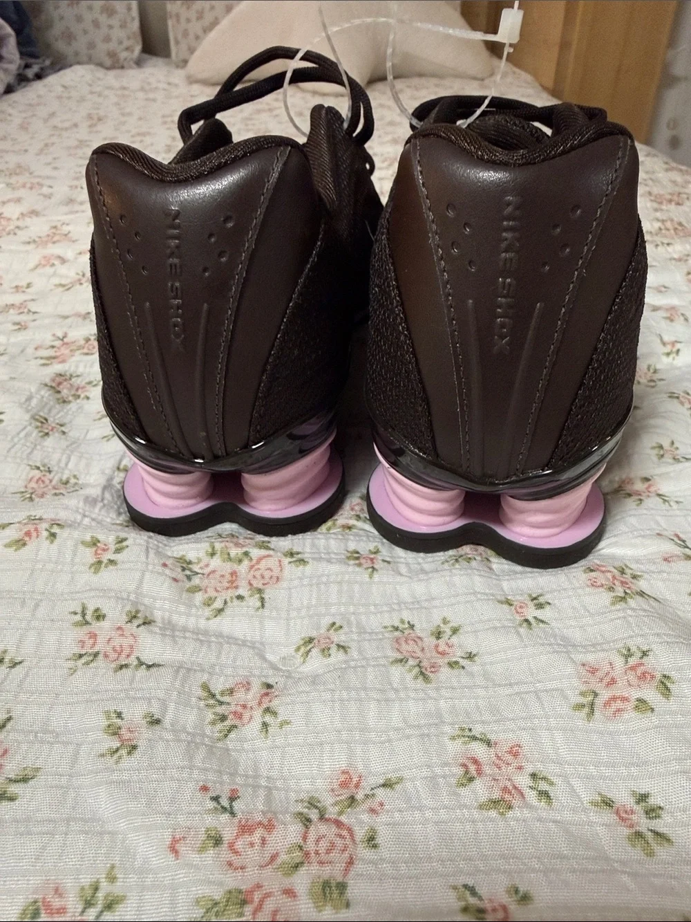 Nike Women's Dark Brown Athletic Shoes with Pink Midsole Accent